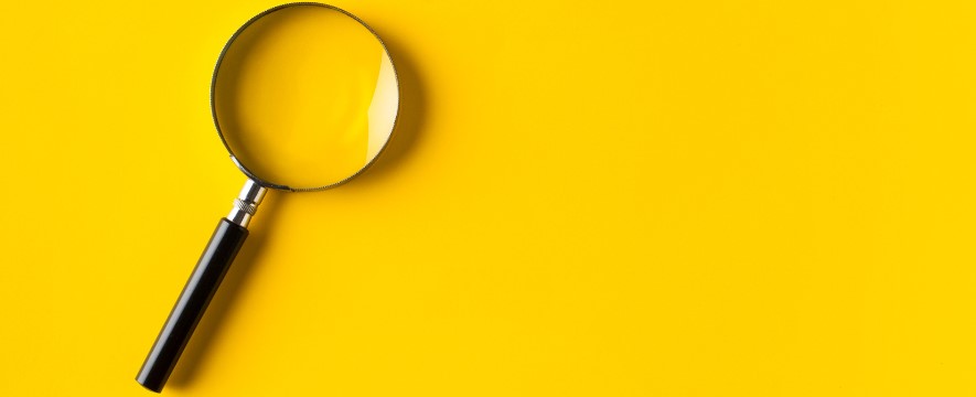 Insights-Official-Template-2023-07-17T104247.157 magnify glass against a yellow backdrop symbolizing how to screen out a bad technical recruiter